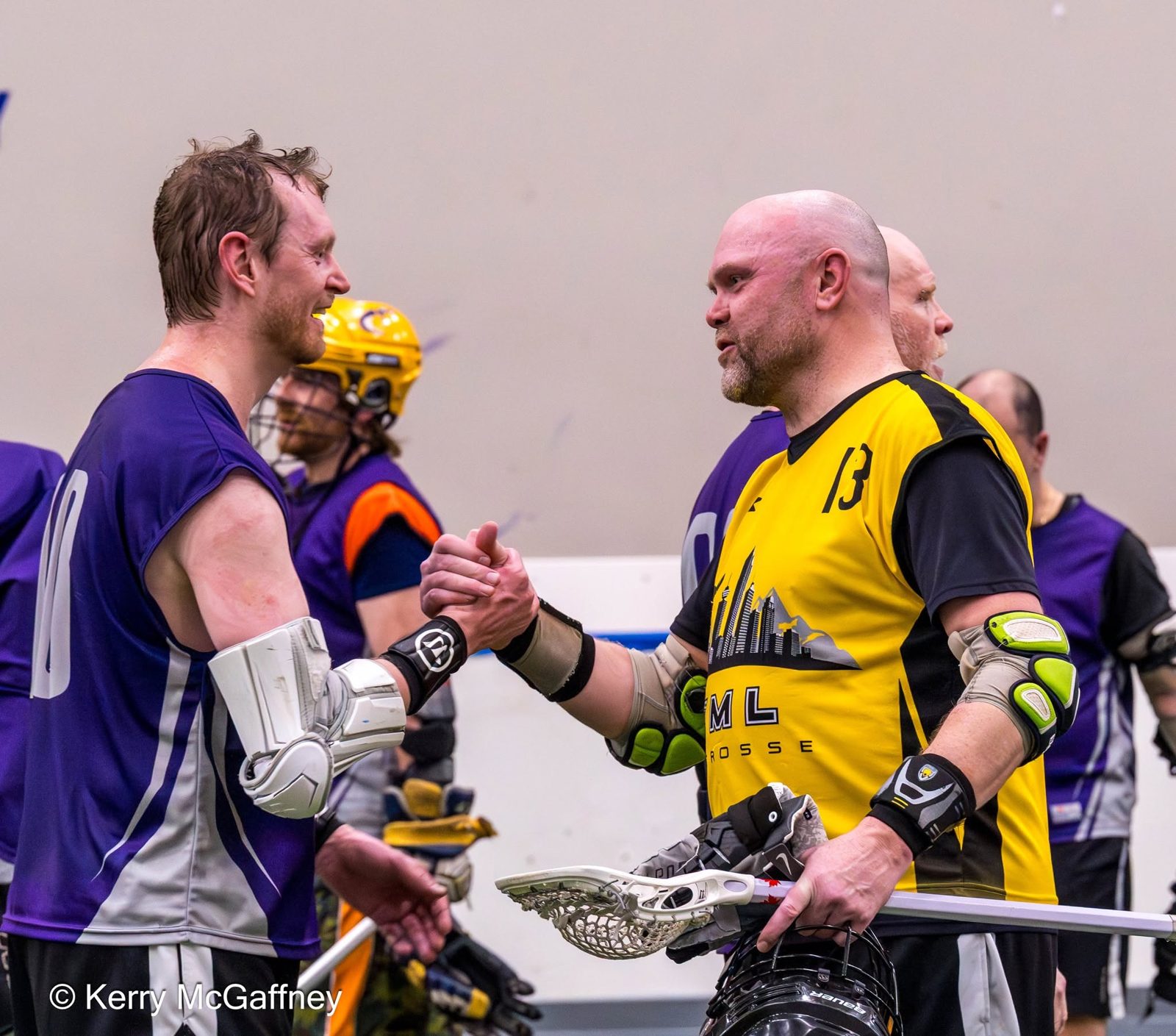 Two players shaking hands after a game